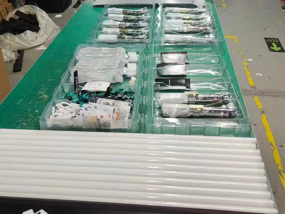 Finished lightsabers lined up for the final pre-shipping check